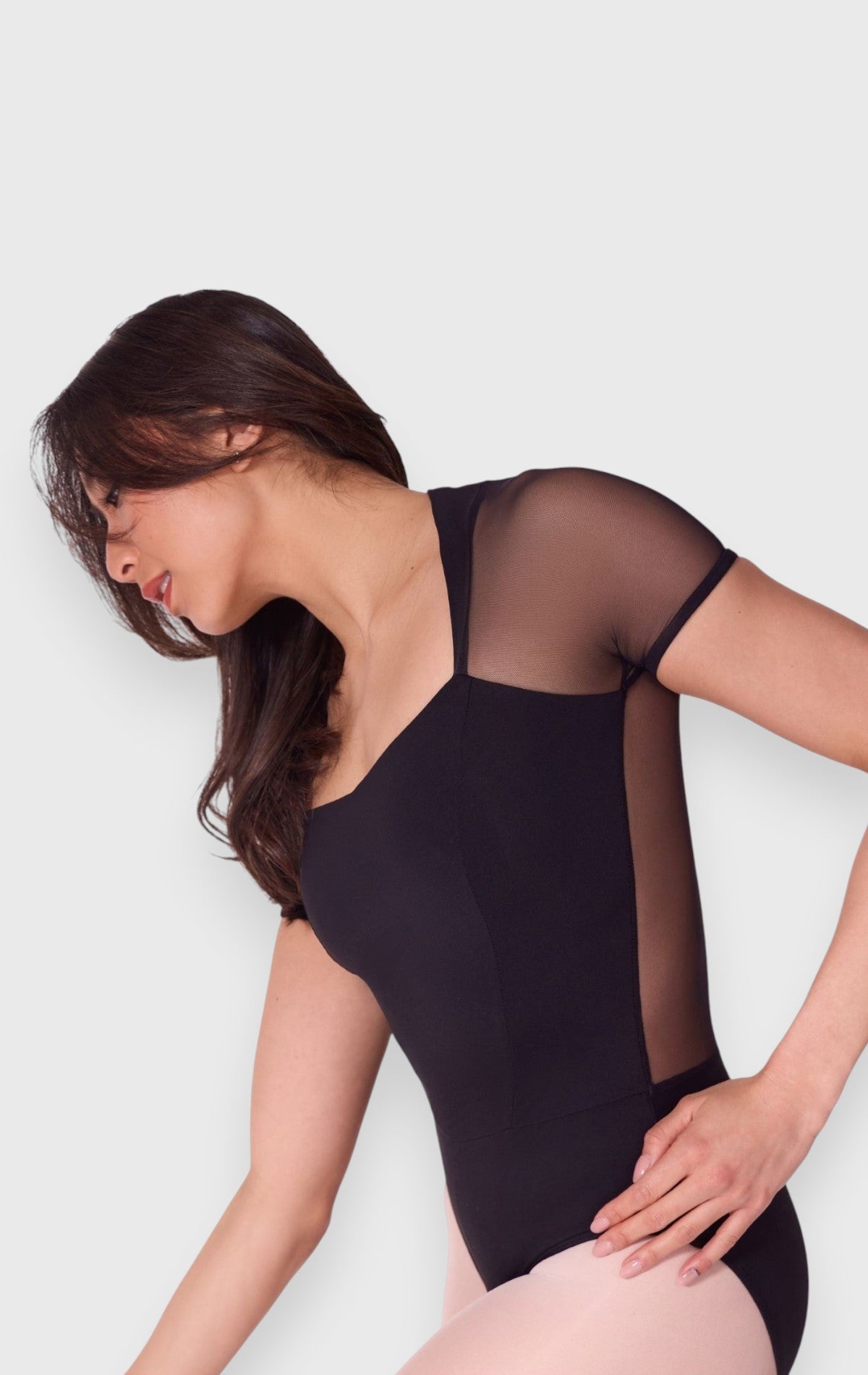 Body danza Capezio con maniche corte
