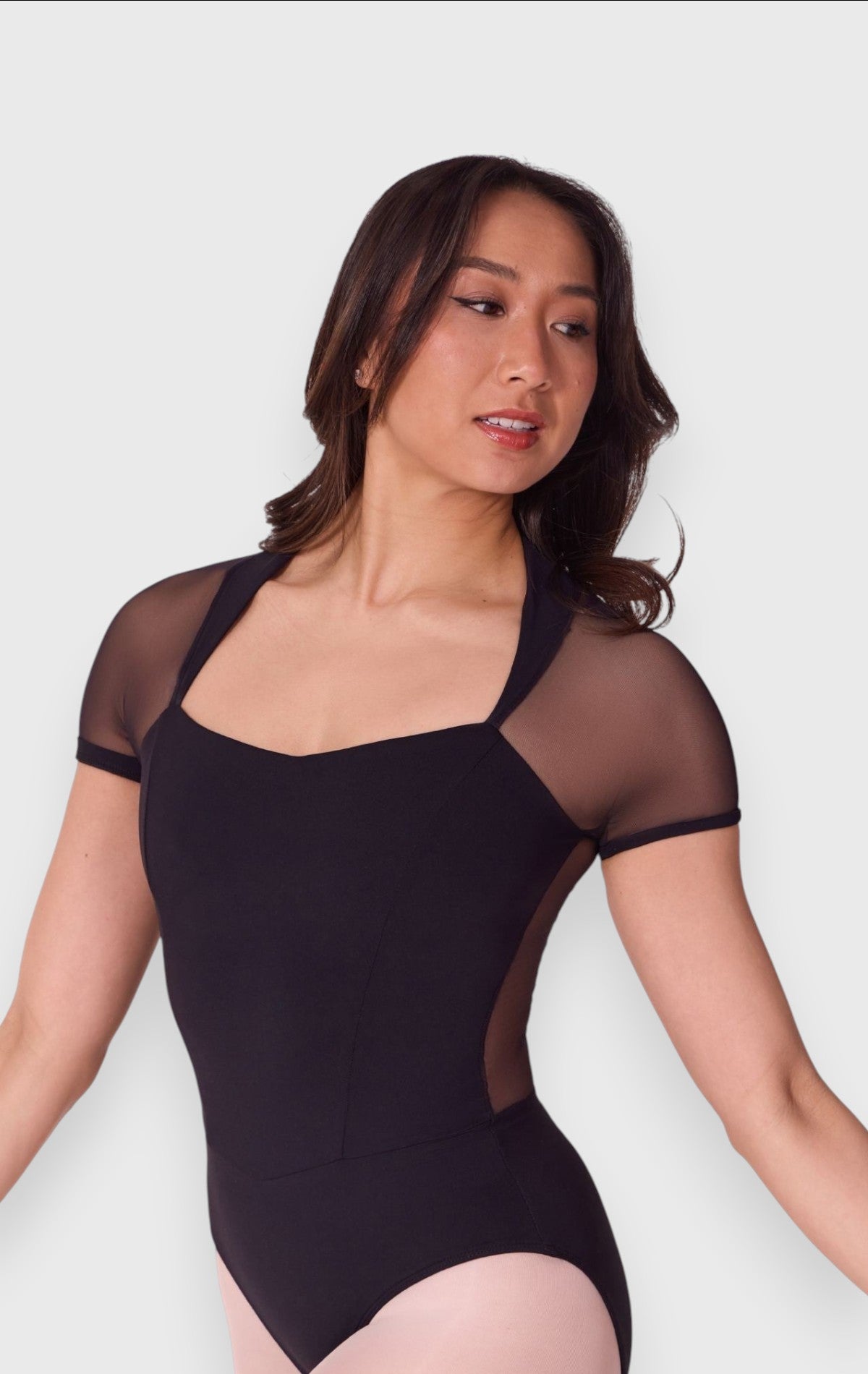Body danza Capezio con maniche corte