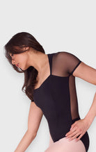 Body danza Capezio con maniche corte