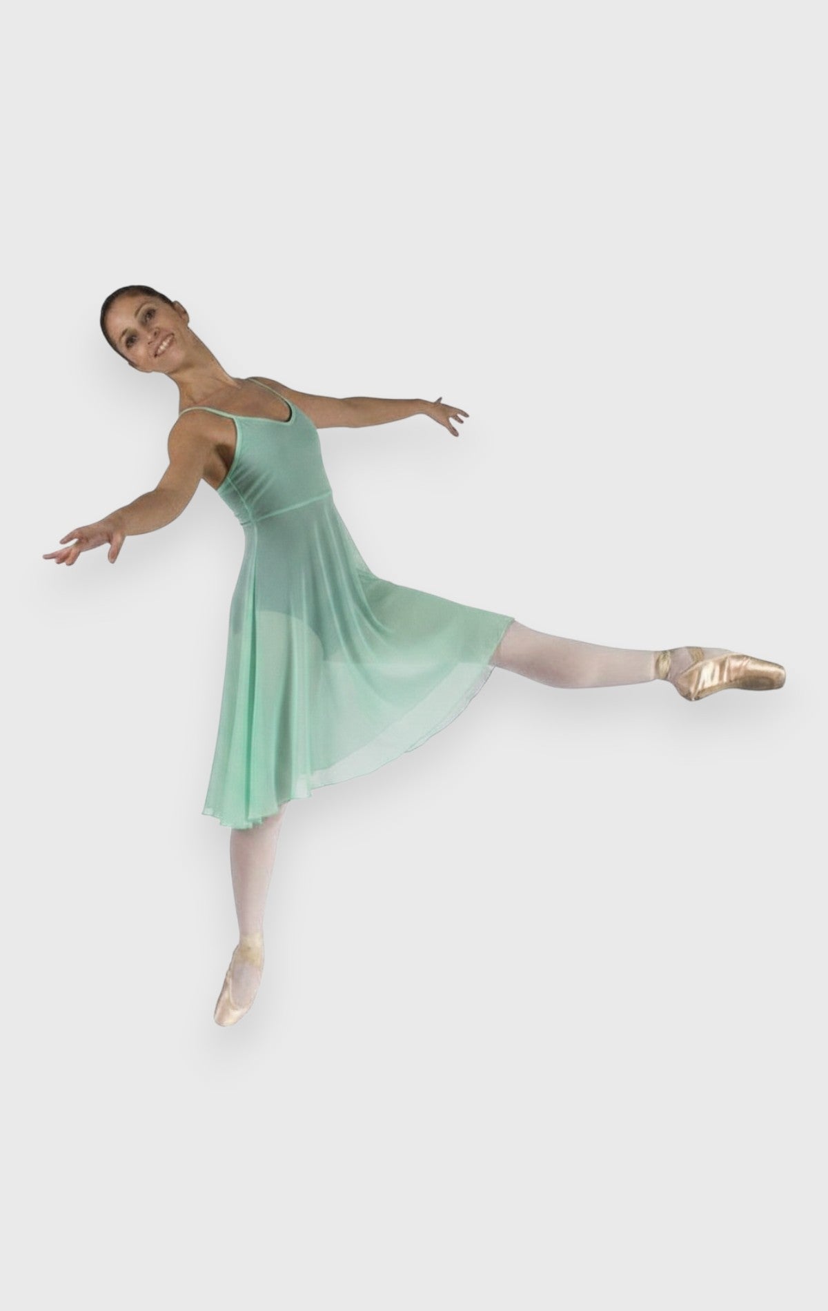 DanzaShop black empire line ballet dress with thin adjustable straps and long tulle skirt worn by a dancer.
