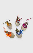 DanzaShop ballet shoe keychains with colorful ribbons and rhinestones. One features 'ITALIA' text.